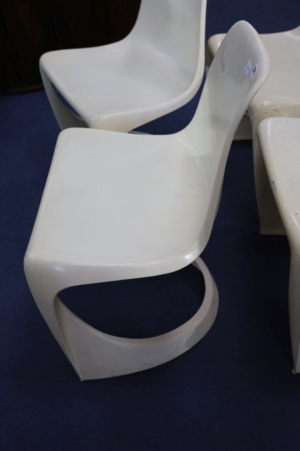 A set of four Cado Danish chairs by Steen Ostergaard (the first ever moulded chairs)